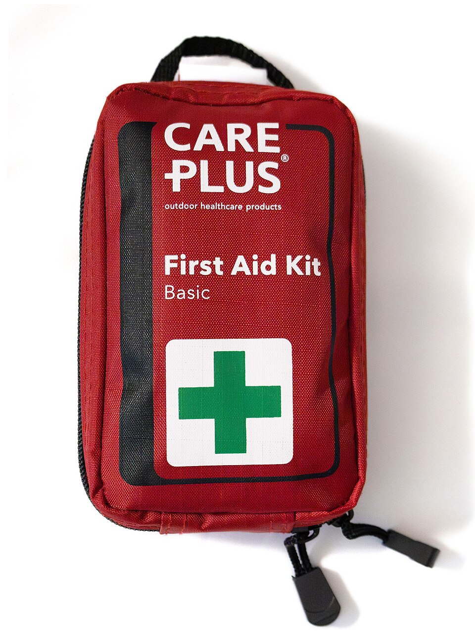 A red zippered pouch labeled First Aid Kit with a green cross, for storm prep in Marion, IA